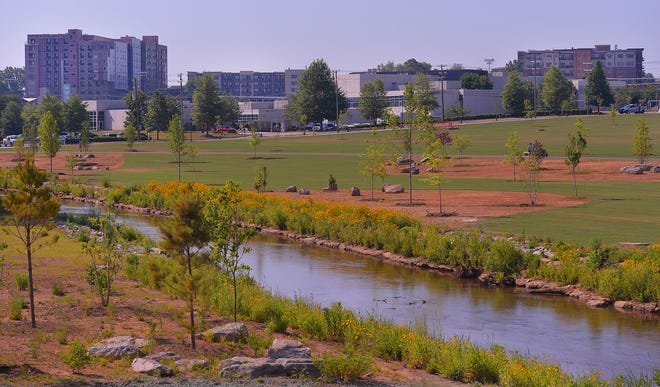 Unity Park held its grand opening on downtown Greenville's west side, Thursday morning, May 19, 2022. The new 60-acre park, nearly two years under construction, completes the "necklace of parks" surrounding downtown. The park "pays homage to the legacies of the neighborhoods surrounding it" and will include affordable housing opportunities.