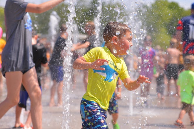 Unity Park held its grand opening on downtown Greenville's west side in May 2022. The new 60-acre park, nearly two years under construction, completes the "necklace of parks" surrounding downtown. The park "pays homage to the legacies of the neighborhoods surrounding it" and will include affordable housing opportunities. Children enjoy the new water park feature.