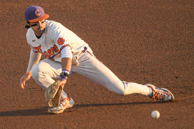 Clemson junior Blake Wright fields the ball against Wake Forest during the top of the second inning at Doug Kingsmore Stadium in Clemson Thursday, March 30, 2023.