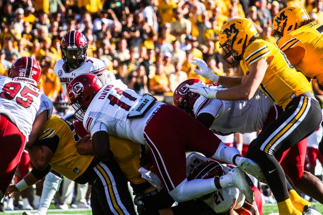 South Carolina's Elijah Davis (11) pounces on a Missouri ball carrier during a college football game at Memorial Stadium on Oct. 21, 2023, in Columbia, Mo.