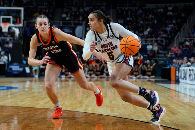 Mar 31, 2024; Albany, NY, USA; South Carolina Gamecocks guard Tessa Johnson (5) dribbles the ball against Oregon State Beavers guard AJ Marotte (11) during the second half in the finals of the Albany Regional of the 2024 NCAA Tournament at MVP Arena. Mandatory Credit: Gregory Fisher-USA TODAY Sports