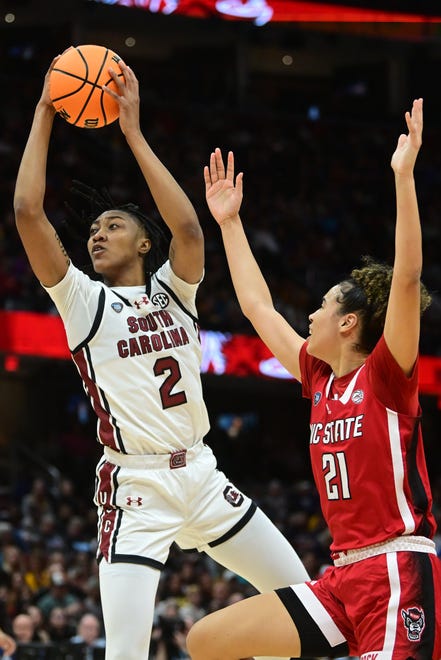 Apr 5, 2024; Cleveland, OH, USA; South Carolina Gamecocks forward Ashlyn Watkins (2) shoots the ball against NC State Wolfpack guard Madison Hayes (21) in the semifinals of the Final Four of the womens 2024 NCAA Tournament at Rocket Mortgage FieldHouse. Mandatory Credit: Ken Blaze-USA TODAY Sports