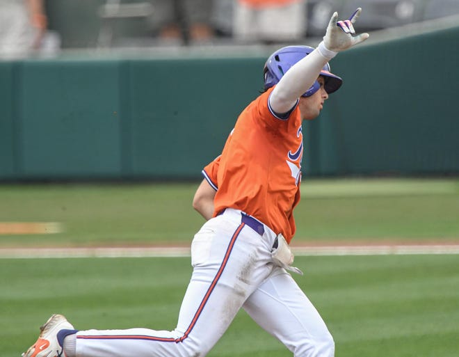 Clemson senior Blake Wright (8) rounds first after hitting a home run against Georgia Tech during the bottom of the third inning at Doug Kingsmore Stadium in Clemson Friday, May 3, 2024.