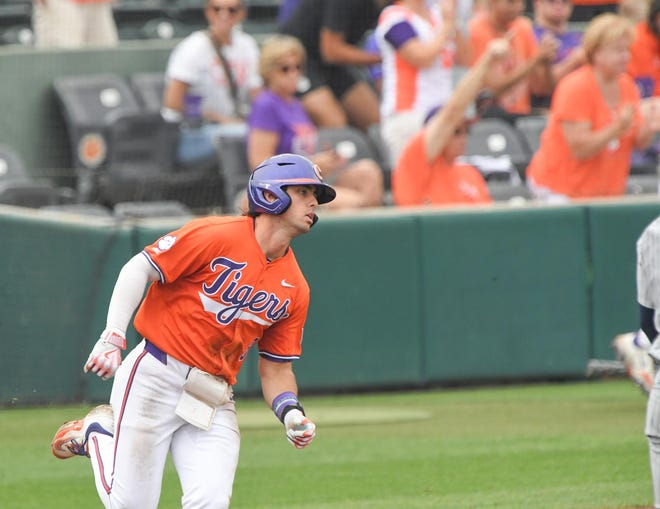 Clemson senior Blake Wright (8) rounds first after hitting a home run against Georgia Tech during the bottom of the third inning at Doug Kingsmore Stadium in Clemson Friday, May 3, 2024.