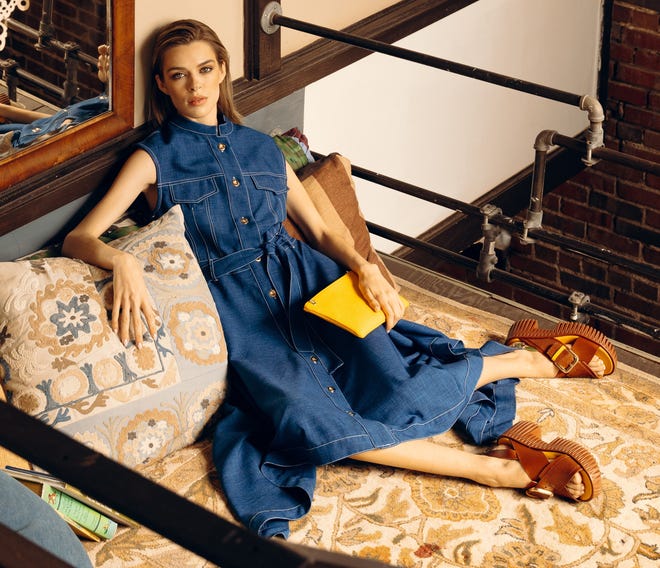 Denim Dress by Milva Mi, $368 at Coleman Collection; Pila Juno Sandal in Brown by 4CCCCEES, $325 at Monkees of the West End; Yellow Clutch by Laboratorio Mariucci, $225 at Coleman Collection