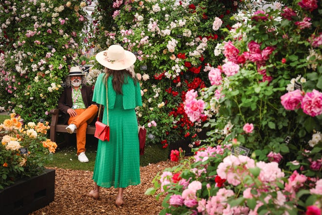 May 20, 2024: People visit The RNLI 200 Anniversary flower display during the preview day at the RHS Chelsea Flower Show in London. Early springs, droughts, and floods are influencing this year's Chelsea Flower Show, which is keener than ever to reflect the changing climate and cut its carbon footprint. The annual exhibition of horticultural excellence and innovation opens to the public in west London, with more than 150,000 visitors expected.