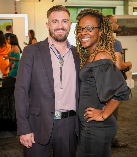 Ronald White, Ahsha Daniels at Greenville Through a Lens, a Fine Arts Exhibit & Cultural Event hosted by The Cunningham Fine Arts Foundation. The event at The Unity Park’s Prisma Health Welcome Center, offered a one of a kind opportunity to experience some of Greenville's Black history on canvas and in performance, including original artwork from artist Timothy Cunningham.