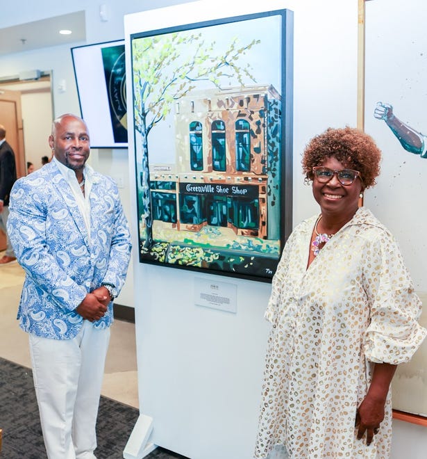 Travis Reeder, Yvonne Reeder at Greenville Through a Lens, a Fine Arts Exhibit & Cultural Event hosted by The Cunningham Fine Arts Foundation. The event at The Unity Park’s Prisma Health Welcome Center, offered a one of a kind opportunity to experience some of Greenville's Black history on canvas and in performance, including original artwork from artist Timothy Cunningham.