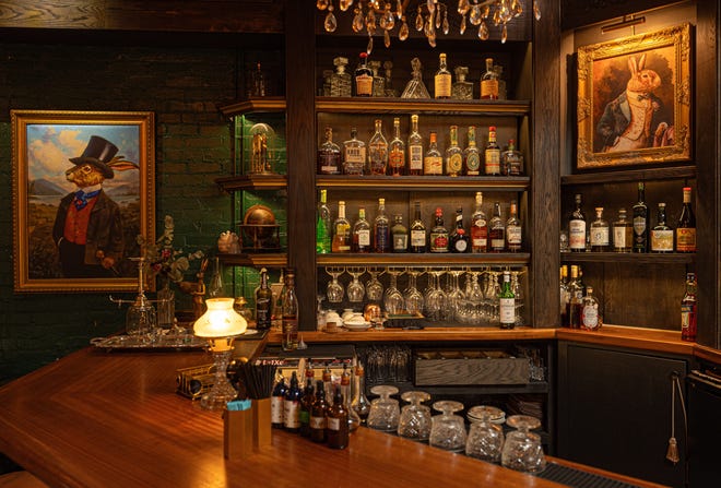 The Rabbit Hole is a Lewis Carroll-inspired speakeasy in Greenville's Village at West En