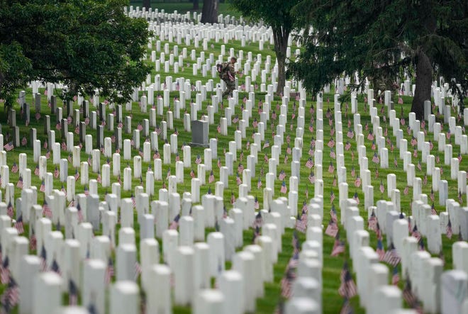 May 23, 2024: Over 1,000 service members placed American flags at approximately 260,000 headstones to honor individuals laid to rest at Arlington National Cemetery ahead of Memorial Day. Since 1948, The Old Guard has placed flags at gravesites in honor of fallen service members.