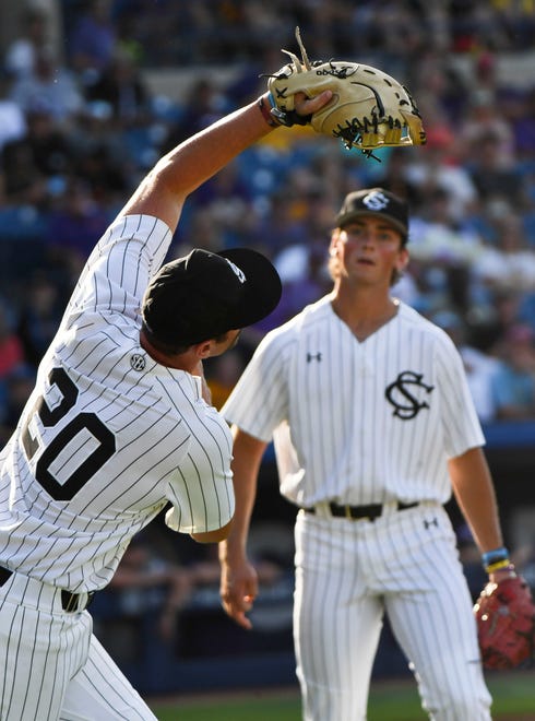 May 23 2024; Hoover, AL, USA; South Carolina first baseman Ethan Petry (20) snags a foul pop for an out against LSU at the Hoover Met during the SEC Tournament.