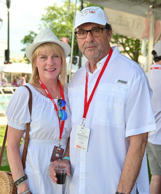 Patrick and Lynn O'Dell t the unveiling of the sculpture “Tandem Lovers,” created by Australian artists Gillie and Marc Schattner, was presented to the City of Greenville as a gift from the Artisphere festival. The downtown arts extravaganza is celebrating its 20th anniversary in 2024. This is the fifth work that the festival has given to the city.