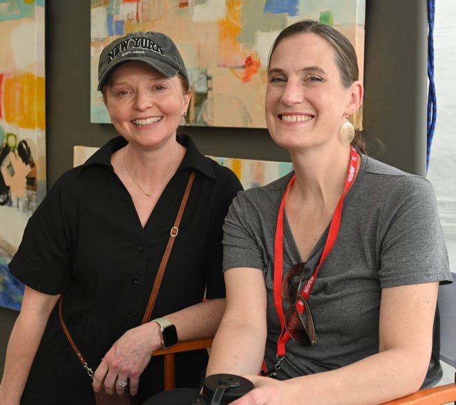 Katherine Irvin, Sarah Farrier at the unveiling of the sculpture “Tandem Lovers,” created by Australian artists Gillie and Marc Schattner, was presented to the City of Greenville as a gift from the Artisphere festival. The downtown arts extravaganza is celebrating its 20th anniversary in 2024. This is the fifth work that the festival has given to the city.