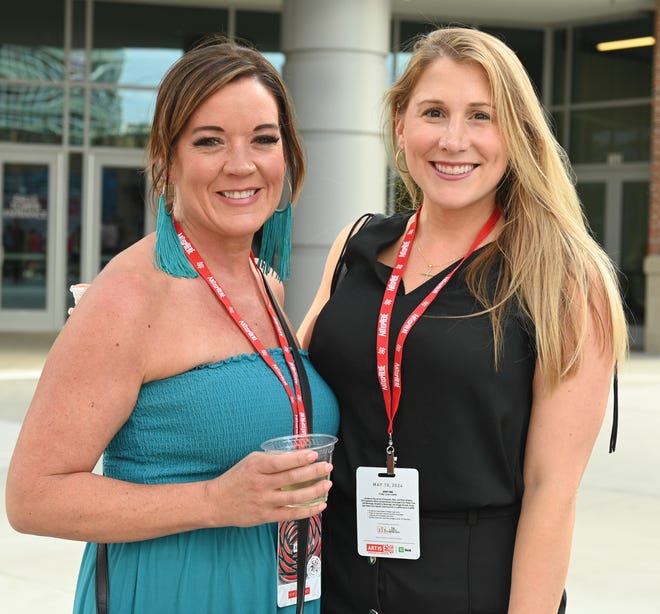 Melissa Eardley, Molly Keller at the unveiling of the sculpture “Tandem Lovers,” created by Australian artists Gillie and Marc Schattner, was presented to the City of Greenville as a gift from the Artisphere festival. The downtown arts extravaganza is celebrating its 20th anniversary in 2024. This is the fifth work that the festival has given to the city.