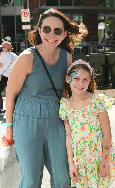 Emily Mosely, Eleanor Mosley at the unveiling of the sculpture “Tandem Lovers,” created by Australian artists Gillie and Marc Schattner, was presented to the City of Greenville as a gift from the Artisphere festival. The downtown arts extravaganza is celebrating its 20th anniversary in 2024. This is the fifth work that the festival has given to the city.