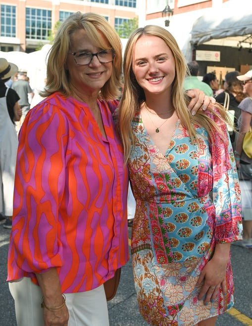 Gracie Carroll, Jeri Carroll at the unveiling of the sculpture “Tandem Lovers,” created by Australian artists Gillie and Marc Schattner, was presented to the City of Greenville as a gift from the Artisphere festival. The downtown arts extravaganza is celebrating its 20th anniversary in 2024. This is the fifth work that the festival has given to the city.