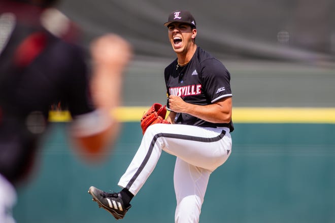 May 24, 2024; Charlotte, NC, USA; Louisville Cardinals pitcher Sebastian Gongora (26) celebrates after a strikeout in the second inning against the Clemson Tigers during the ACC Baseball Tournament at Truist Field. Mandatory Credit: Scott Kinser-USA TODAY Sports