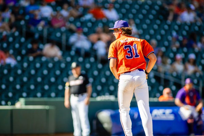 May 24, 2024; Charlotte, NC, USA; Clemson Tigers pitcher Jacob McGovern (31) walks off after closing the sixth inning against the Louisville Cardinals during the ACC Baseball Tournament at Truist Field. Mandatory Credit: Scott Kinser-USA TODAY Sports