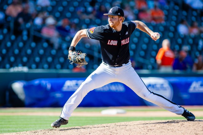 May 24, 2024; Charlotte, NC, USA; Louisville Cardinals pitcher Evan Webster (27) takes the mound in the sixth inning against the Clemson Tigers during the ACC Baseball Tournament at Truist Field. Mandatory Credit: Scott Kinser-USA TODAY Sports