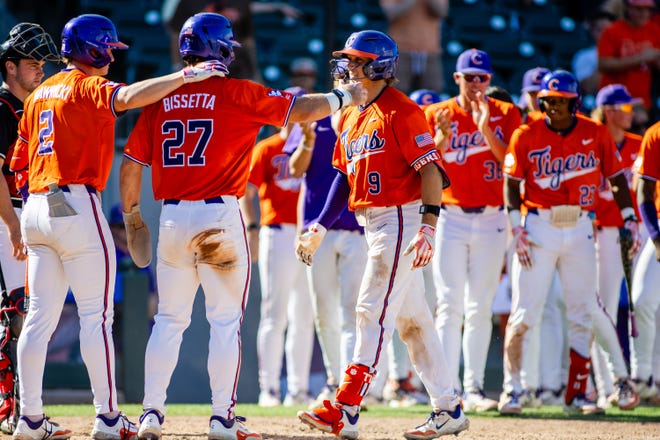 May 24, 2024; Charlotte, NC, USA; Clemson Tigers catcher Jacob Jarrell (9) celebrates at home plate after a sixth inning home run against the Louisville Cardinals during the ACC Baseball Tournament at Truist Field. Mandatory Credit: Scott Kinser-USA TODAY Sports