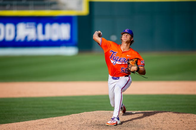 May 24, 2024; Charlotte, NC, USA; Clemson Tigers pitcher Austin Gordon (56) starts the eighth inning against the Louisville Cardinals during the ACC Baseball Tournament at Truist Field. Mandatory Credit: Scott Kinser-USA TODAY Sports