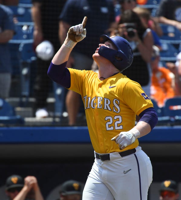 May 26 2024; Hoover, AL, USA; LSU batter Jared Jones (22) gestures heavenward as he enjoys his home run trot after hitting a solo shot to left against Tennessee at the Hoover Met during the championship game of the SEC Tournament.