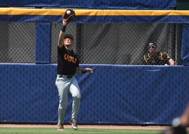 May 26 2024; Hoover, AL, USA; Tennessee outfielder Dylan Dreiling (8) makes a catch deep in center against LSU at the Hoover Met during the championship game of the SEC Tournament.