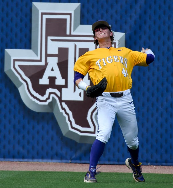 May 26 2024; Hoover, AL, USA; LSU right fielder Ashton Larson (44) plays a ball off the wall and throws back to the infield against Tennessee at the Hoover Met during the championship game of the SEC Tournament.