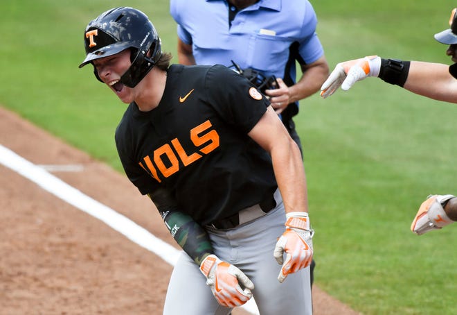 May 26 2024; Hoover, AL, USA; Tennessee batter Billy Amick (11) celebrates after hitting a three-run homer against LSU at the Hoover Met during the championship game of the SEC Tournament.