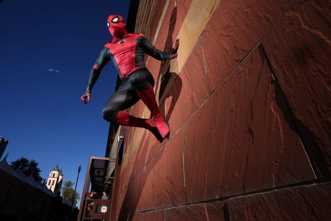 May 25, 2024 : Allan Tapia poses for a photo as Spiderman during Fan Fusion at the convention center in downtown Phoenix.