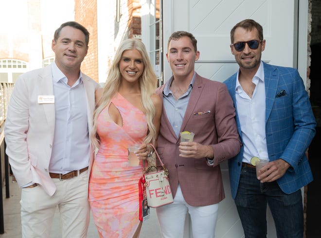 Kyle Putnam, Cheyenne Putnam, Jordan Lindsey Mills Armstrong at the Opening Night VIP Gala for Artisphere’s 20th anniversary, held at the Events at Judson Mill venue. Attendees enjoyed food and drinks by Table 301 and music by the Fly Fidelity band.