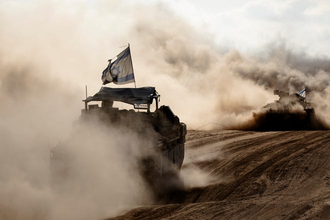 May 29, 2024 : Israeli armored personnel carriers move along the border with the Gaza Strip in Southern Israel, Israel. In recent days, Israeli forces have pressed farther into central Rafah, despite international objections to a ground offensive in Gaza's southernmost city. A US spokesperson said he doesn't believe the activity constitutes a "major ground offensive" in Rafah by Israel, which the US said it would not support.