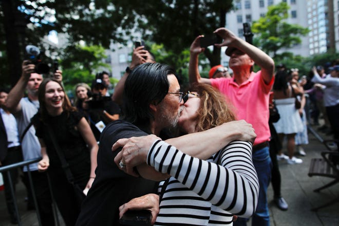 People react after former President and Republican presidential candidate Donald Trump was convicted in his criminal trial outside of Manhattan Criminal Court in New York City, on May 30, 2024.