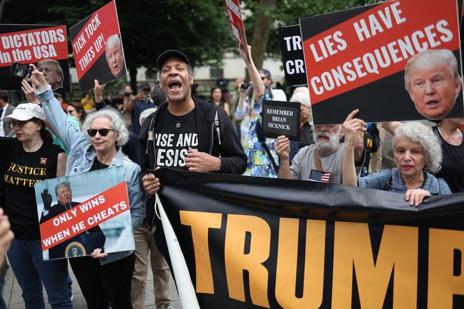 People react after former President and Republican presidential candidate Donald Trump was convicted in his criminal trial outside of Manhattan Criminal Court in New York City, on May 30, 2024. A panel of 12 New Yorkers were unanimous in their determination that Donald Trump is guilty as charged,