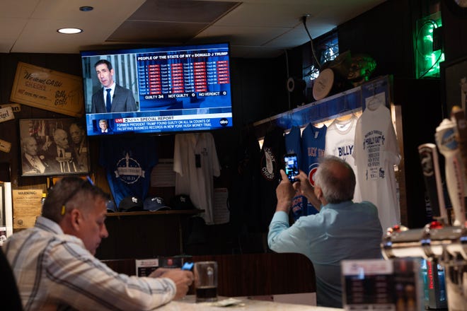 The trial of Republican presidential candidate former President Donald Trump is broadcast on the television at the Billy Goat Tavern on May 30, 2024 in Chicago. The former president was found guilty on all counts and is expected to be sentenced on July 11.