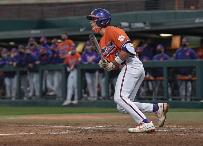 Clemson freshman Blake Wright(8) hits during the bottom of the sixth inning at Doug Kingsmore Stadium in Clemson Friday, February 19,2021.