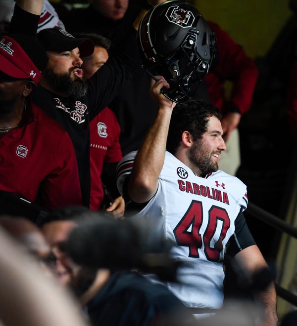 South Carolina kicker Alex Herrera (40) cheers after the game at Memorial Stadium that resulted in a 31-30 win for the Gamecocks in Clemson, South Carolina Saturday, Nov. 26, 2022.