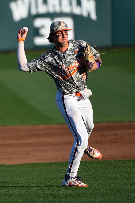 Clemson junior Blake Wright (8) makes a play at first during a game against Georgia at Doug Kingsmore Stadium in Clemson Tuesday, April 18, 2023.