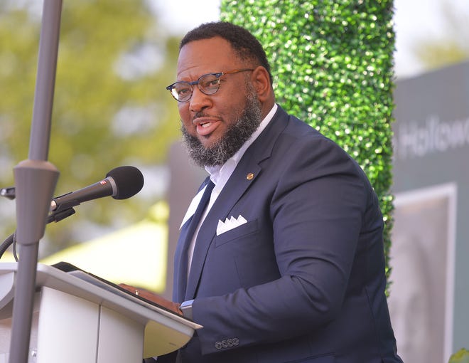 Unity Park held its grand opening on downtown Greenville's west side, Thursday morning, May 19, 2022. Pastor Stacey Mills, with Mountain View Baptist Church, speaks during the ceremony.