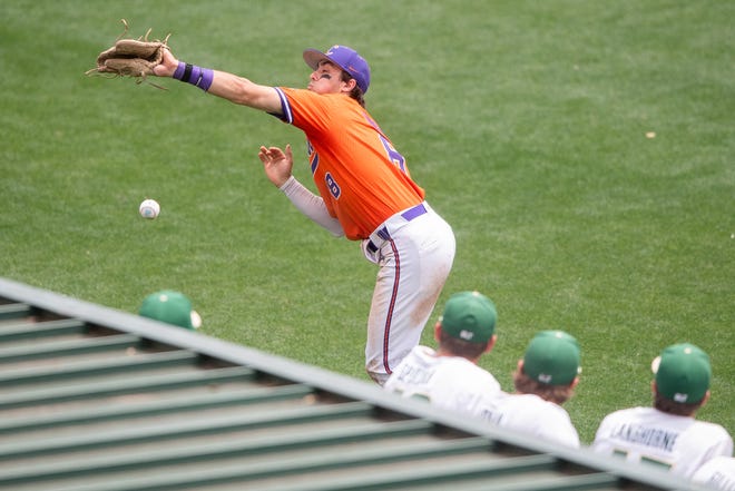 Clemson's Blake Wright(8) fails to catch a foul ball for an out during a NCAA baseball regional game between Clemson and Charlotte held at Doug Kingsmore Stadium in Clemson, S.C., on Sunday, June 4, 2023.